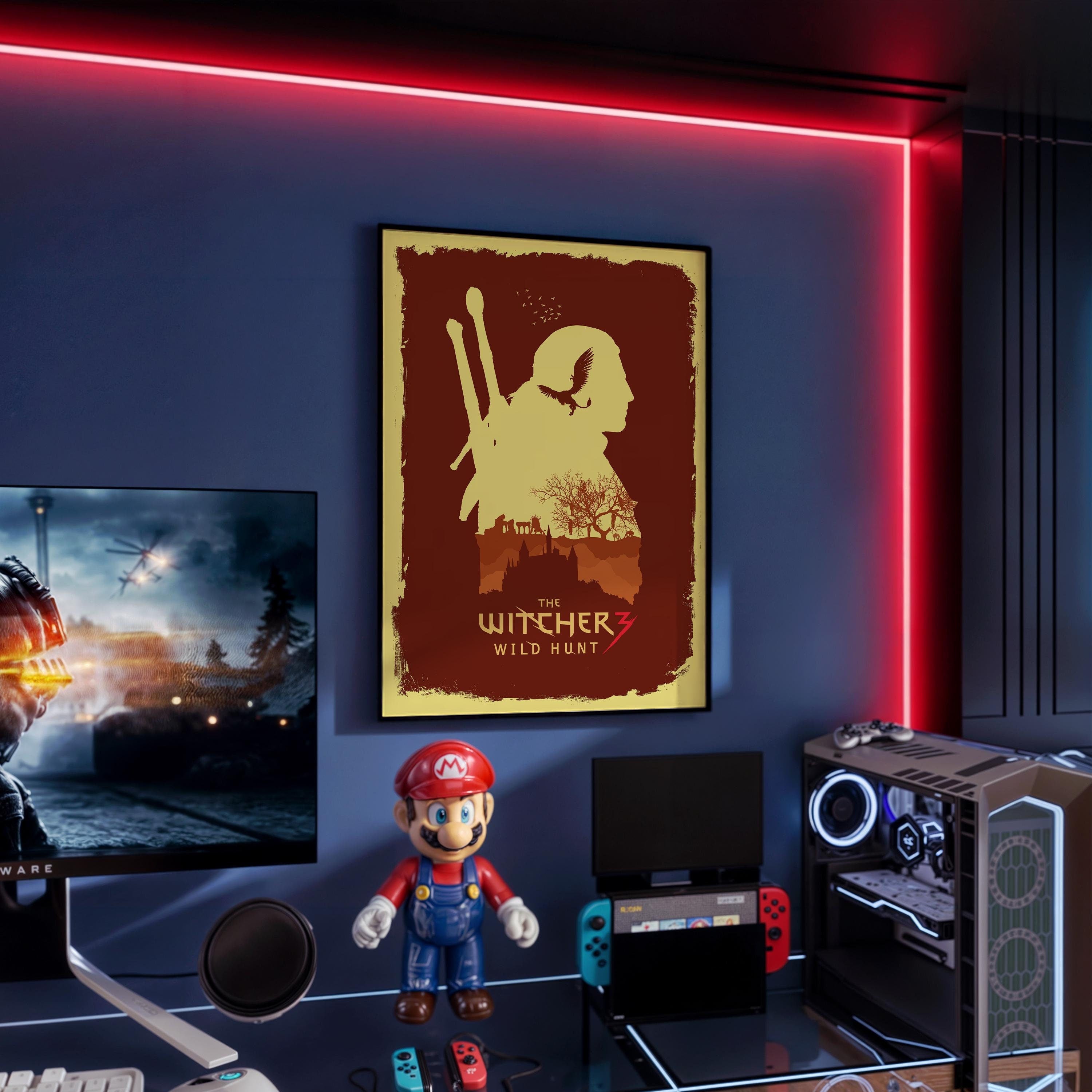 poster di the witcher 3 incorniciato e appeso a parete su scrivania da gaming